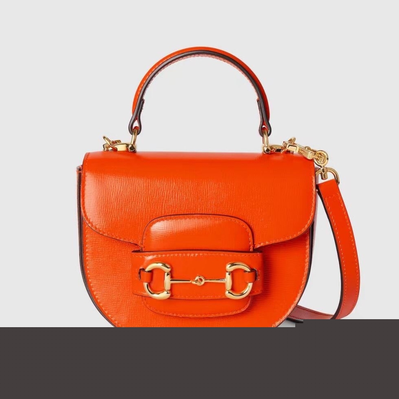 G*u*i top handle bags
